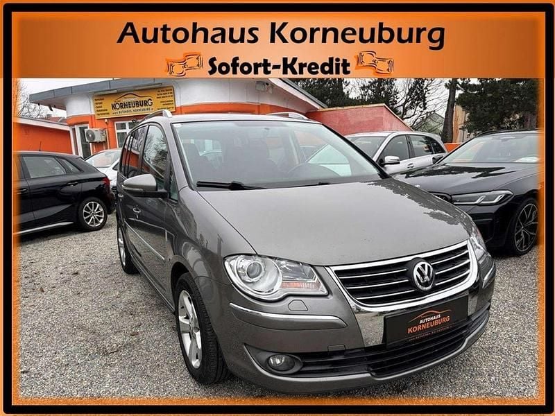 Grau Gebraucht 2010 VW Touran Highline Van / Kleinbus | € 5.990 (Fairer Preis) - Bild 1/4