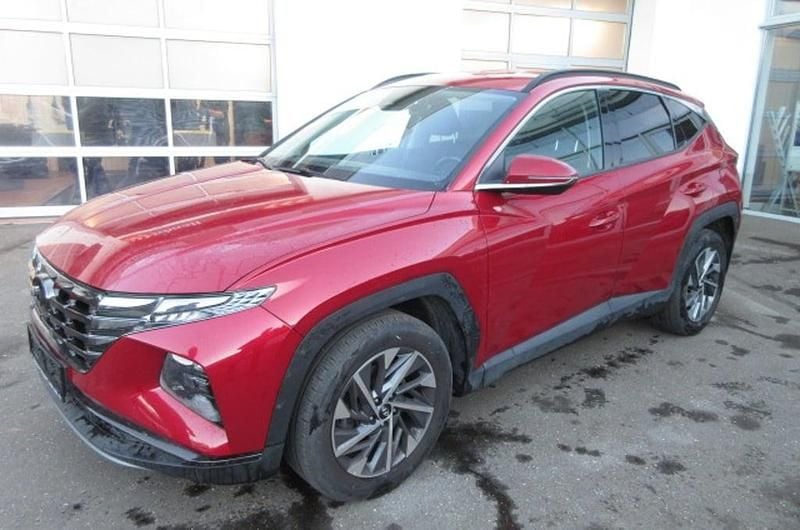 Mittelrot metallicperleffekt Gebraucht 2023 Hyundai Tucson GO! SUV | € 25.400 - Bild 1/4