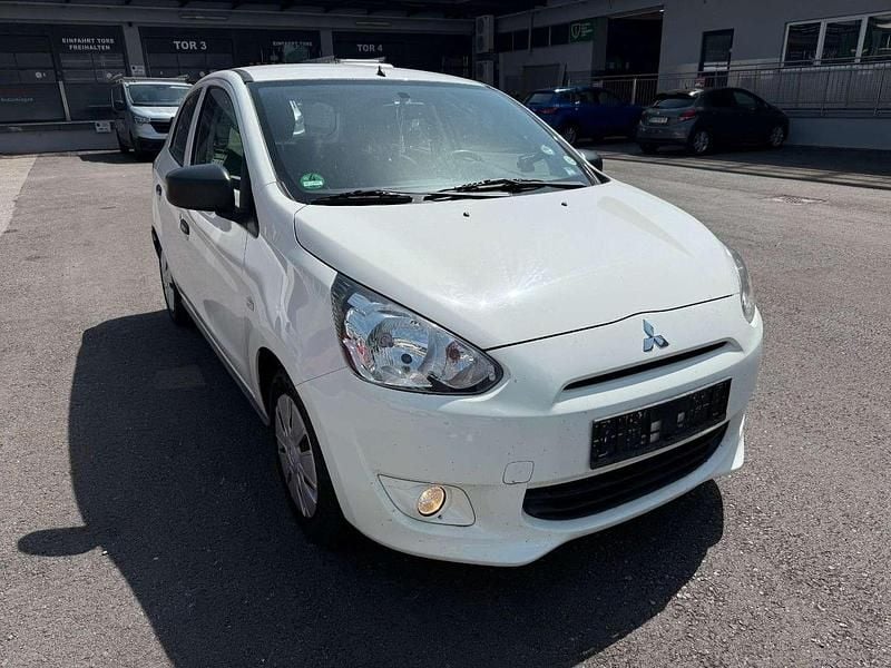 Gebraucht Mitsubishi Space Star Basis 71 PS (52 kW) 2014 Weiß Kleinwagen
