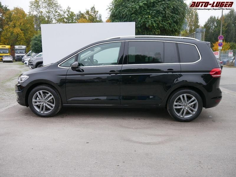 Neu VW Touran Comfortline 150 PS (110 kW) 2026 Grenadilla schwarz metallic Van / Kleinbus