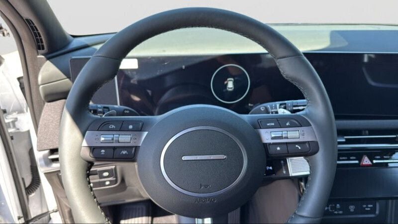 Gebraucht Hyundai Tucson 159 PS (116 kW) 2023 Serenity white / schwarz SUV