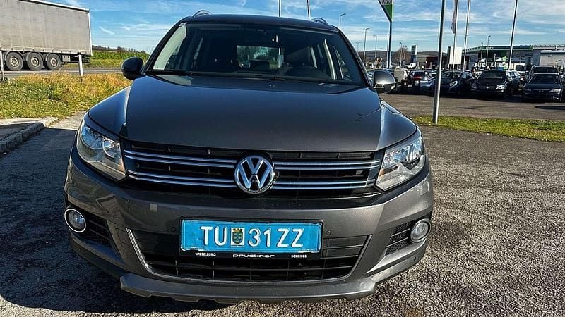 Grau Gebraucht 2015 VW Tiguan SUV | € 11.590 (Superpreis) - Bild 1/4