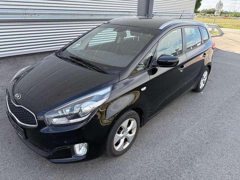 Schwarz Gebraucht 2014 Kia Carens Motion Van / Kleinbus | € 4.990 - Bild 1/4