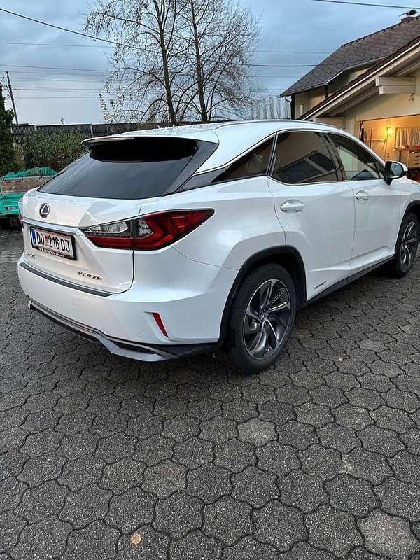Weiß Gebraucht 2016 Lexus RX450h E-FOUR SUV | € 40.000 - Bild 1/4