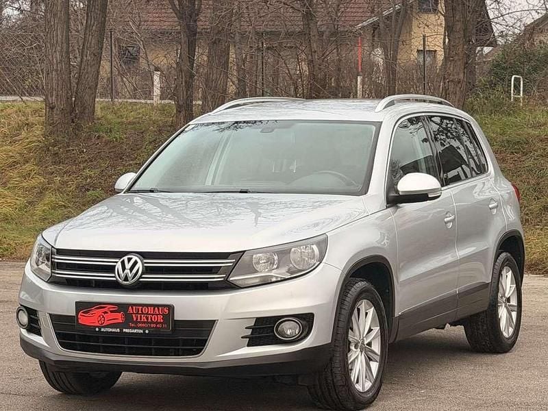 Grau Gebraucht 2013 VW Tiguan Sportline SUV | € 11.990 (Fairer Preis) - Bild 1/4