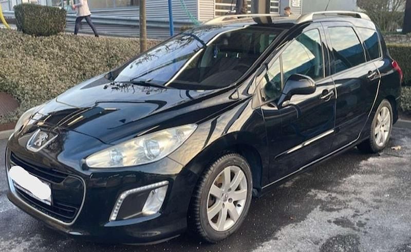 Gebraucht Peugeot 308 SW 111 PS (81 kW) 2012 Schwarz Kombi
