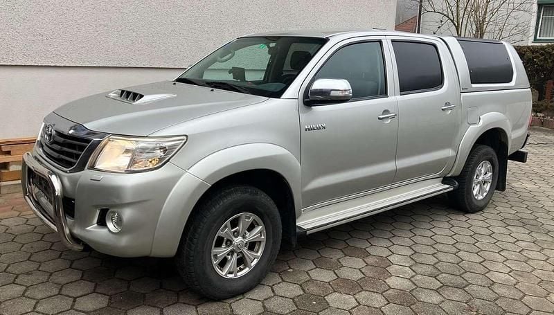 Silber Gebraucht 2013 Toyota HiLux Abholung | € 15.500 - Bild 1/4