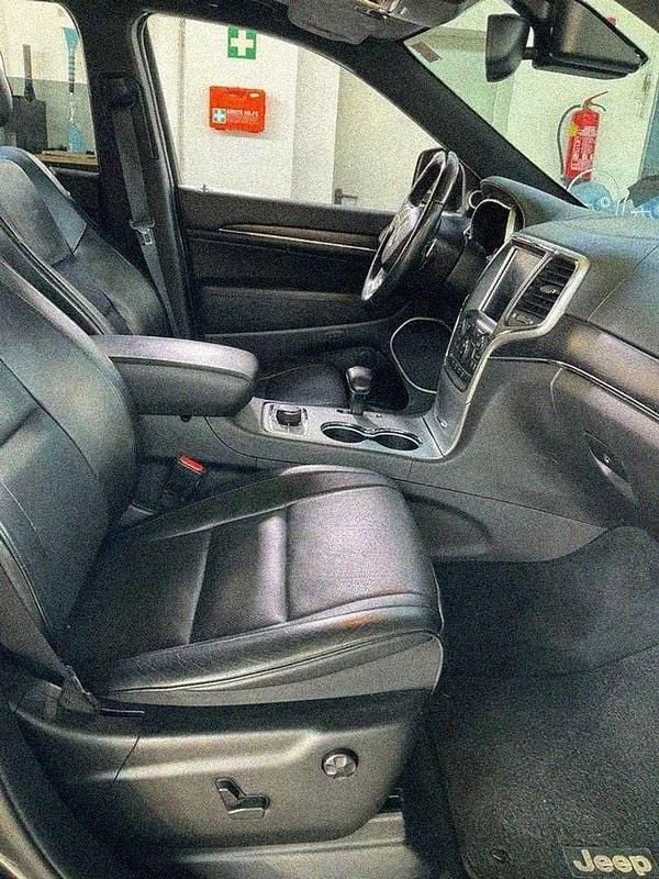 Grau Gebraucht 2013 Jeep Grand Cherokee Summit SUV | € 13.399 (Guter Preis) - Bild 1/4