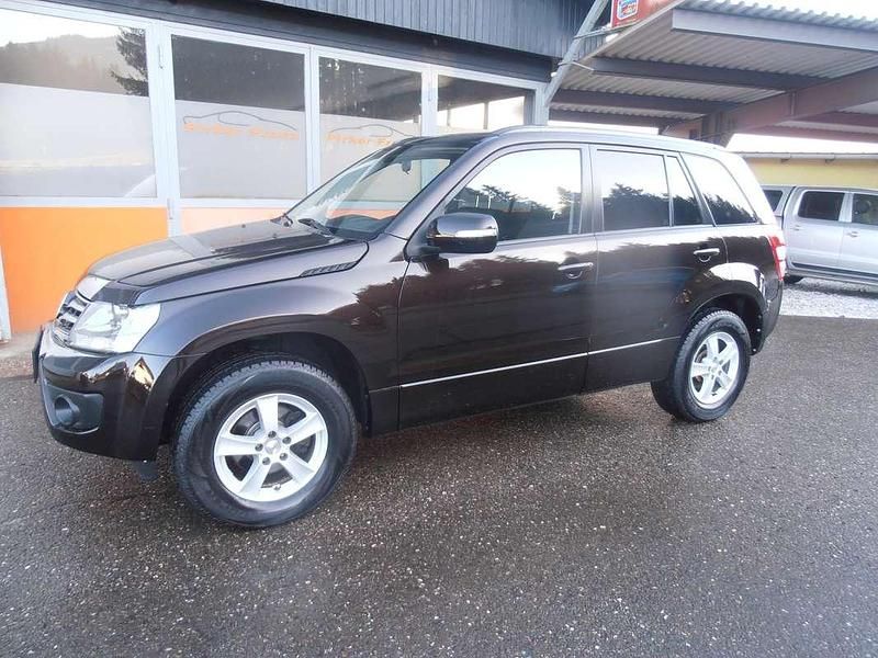 Braun Gebraucht 2013 Suzuki Grand Vitara SUV | € 14.900 - Bild 1/4
