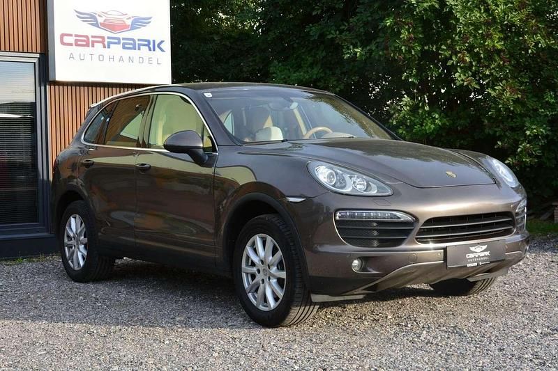 Braun Gebraucht 2013 Porsche Cayenne SUV | € 23.890 (Fairer Preis) - Bild 1/4