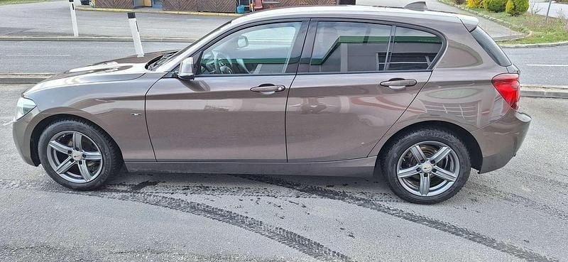 Bronze Gebraucht 2014 BMW 116 Sport Line Kleinwagen | € 10.500 - Bild 1/4