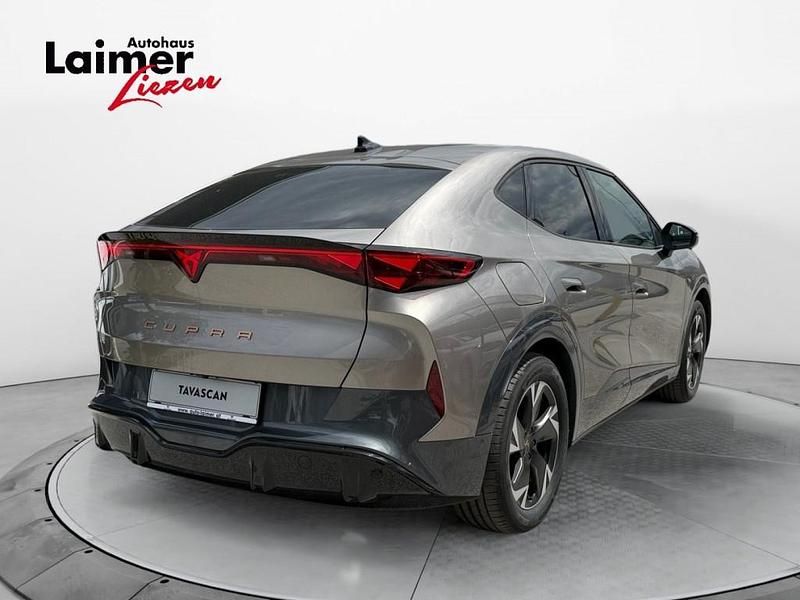 Gebraucht Cupra Tavascan 210 kW (286 PS) 2025 Hellbraun  metallic SUV