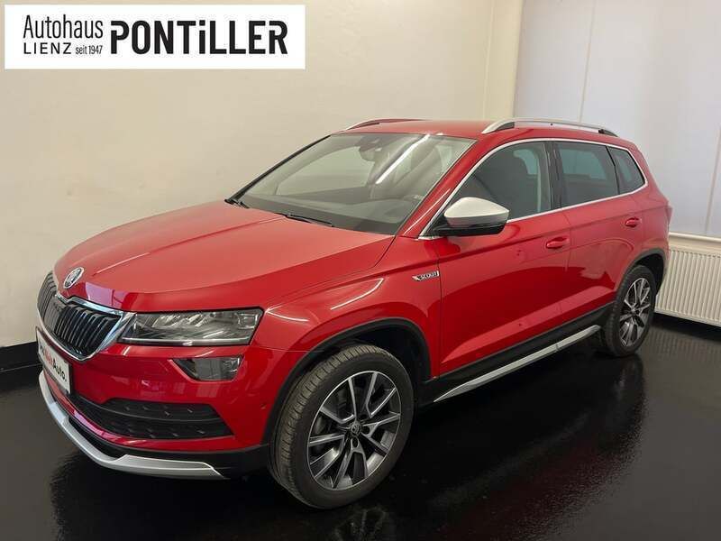 Mittelrot metallic Gebraucht 2020 Skoda Karoq SUV | € 30.990 (Teuer) - Bild 1/4