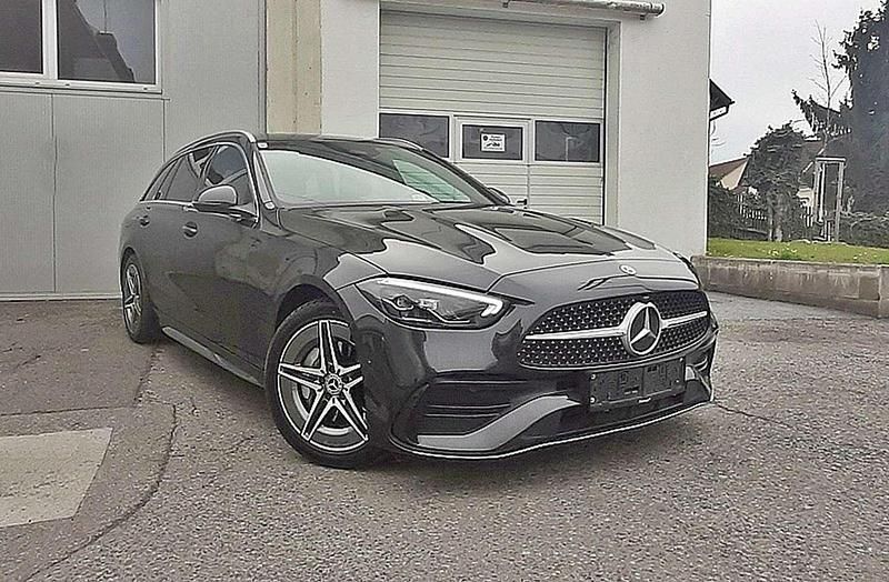 Grau Gebraucht 2022 Mercedes C300e AMG line Kombi | € 38.800 (Teuer) - Bild 1/4
