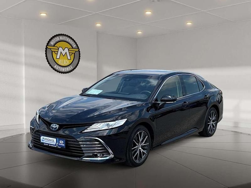 Schwarz Gebraucht 2023 Toyota Camry Hybrid Lounge Limousine | € 34.490 - Bild 1/4