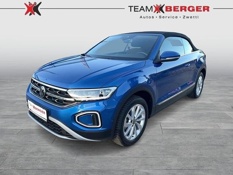 Mittelblau metallic Gebraucht 2024 VW T-Roc Style SUV | € 28.990 (Fairer Preis) - Bild 1/4
