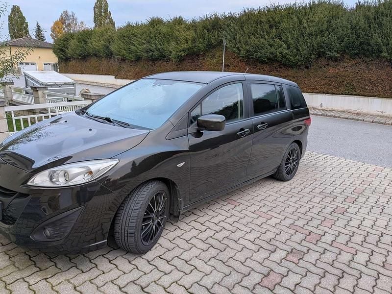 Schwarz Gebraucht 2011 Mazda 5 Van / Kleinbus | € 3.990 - Bild 1/4