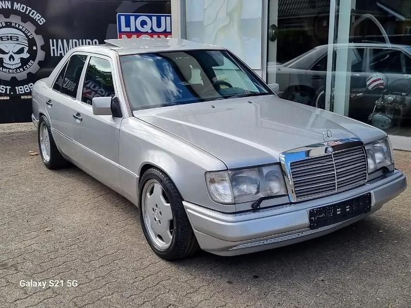 Silber Gebraucht 1992 Mercedes E400 | € 24.900 - Bild 1/4