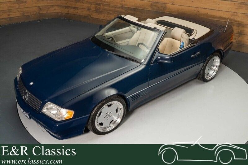 Dunkelblau Gebraucht 1993 Mercedes SL300 Cabrio | € 19.950 - Bild 1/3