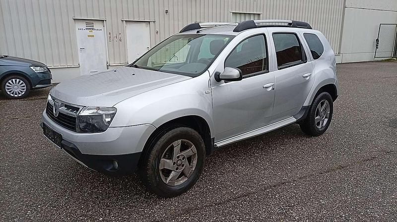 Silber Gebraucht 2013 Dacia Duster Lauréate SUV | € 6.480 (Superpreis) - Bild 1/4