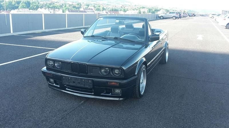 Gebraucht BMW 318 Cabriolet 113 PS (83 kW) 1991 Schwarz Cabrio