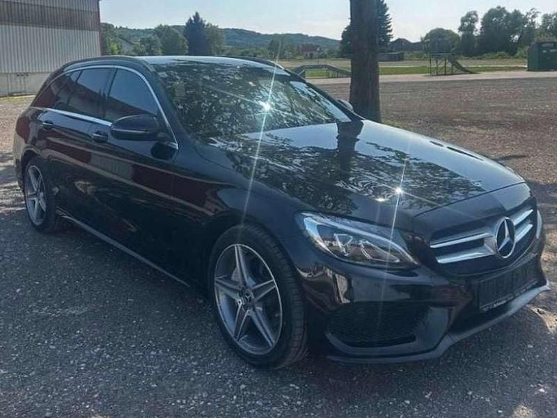 Schwarz Gebraucht 2018 Mercedes C220 AMG line Kombi | € 21.900 (Fairer Preis) - Bild 1/4