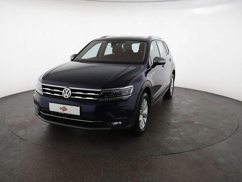 Dunkelblau metallic Gebraucht 2021 VW Tiguan Allspace Highline SUV | € 30.990 (Guter Preis) - Bild 1/3
