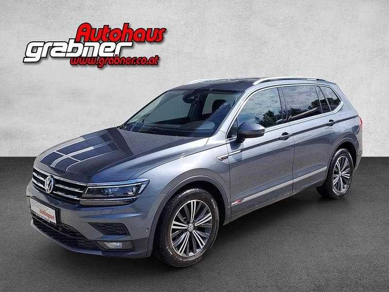 Dunkelgrau metallic Gebraucht 2018 VW Tiguan Allspace SUV | € 26.500 (Fairer Preis) - Bild 1/4