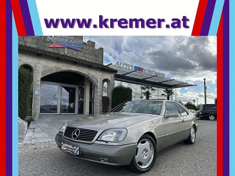 Gold Gebraucht 1994 Mercedes 500 Coupé | € 26.900 - Bild 1/4