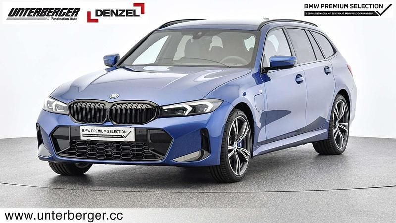 M portimao blau Gebraucht 2023 BMW 330e M Sport Kombi | € 49.400 (Teuer) - Bild 1/4