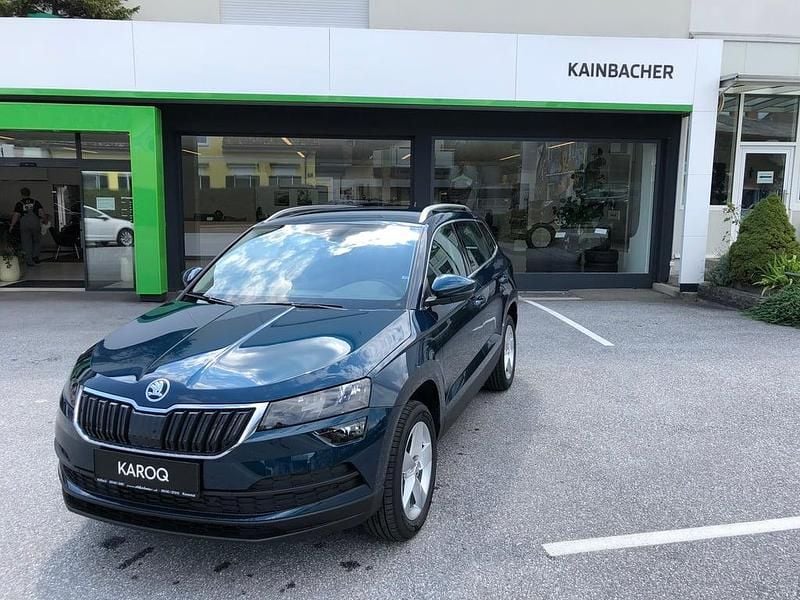 Dunkelblau metallic Gebraucht 2021 Skoda Karoq Ambition SUV | € 17.950 (Superpreis) - Bild 1/4