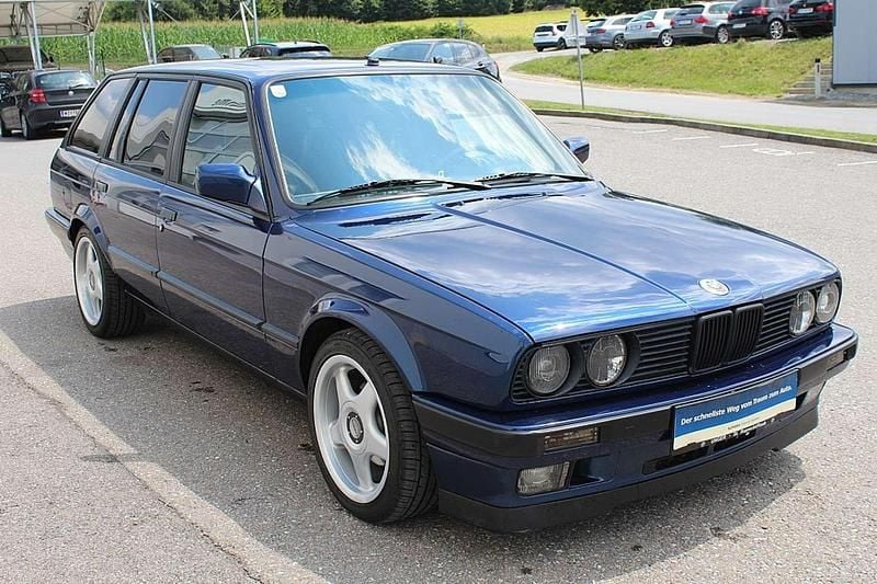 Gebraucht BMW 320 129 PS (94 kW) 1994 Blau Kombi