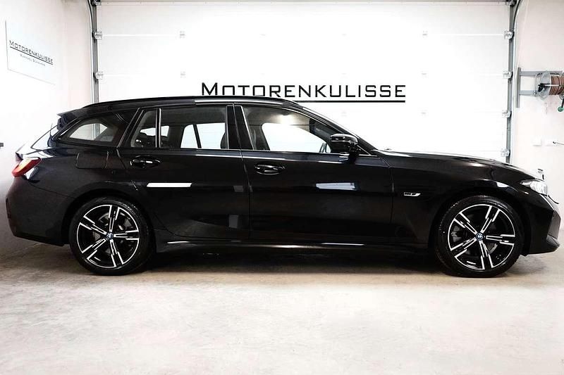 Gebraucht BMW 320e M Sport 204 PS (150 kW) 2022 Schwarz Kombi