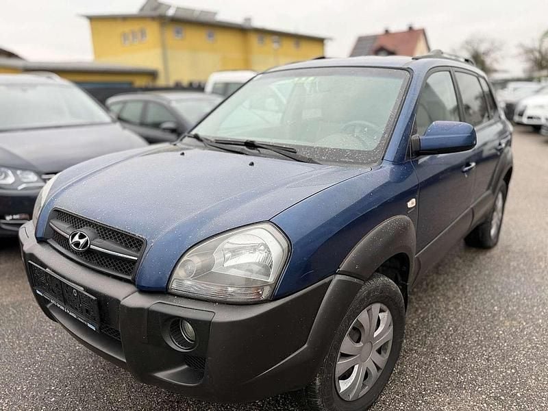 Blau Gebraucht 2006 Hyundai Tucson Style SUV | € 999 (Superpreis) - Bild 1/4
