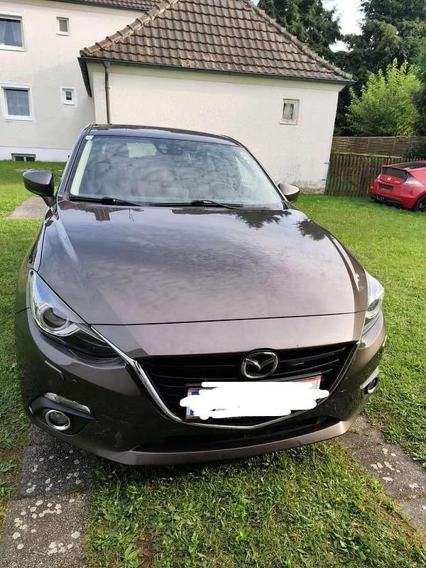 Braun Gebraucht 2014 Mazda 3 Inclusive Limousine | € 8.900 (Fairer Preis) - Bild 1/4