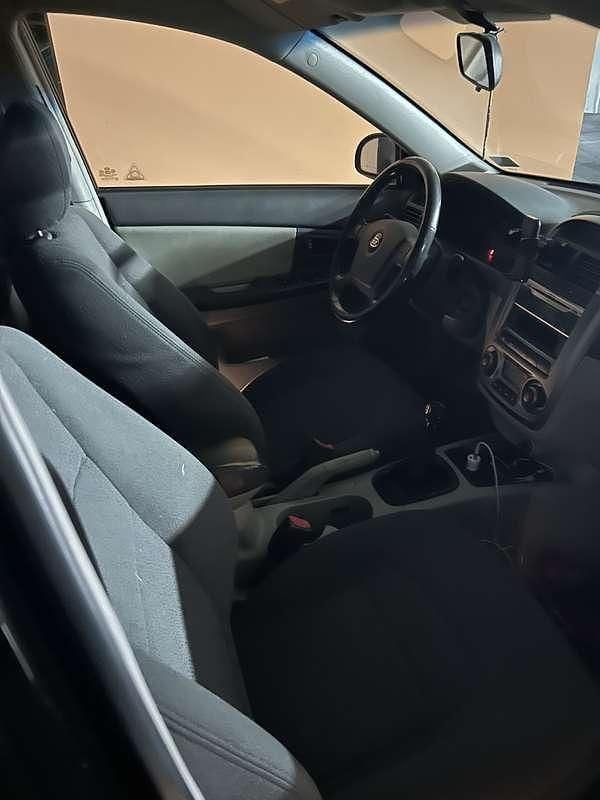 Gebraucht Kia Cerato Active 116 PS (85 kW) 2006 Schwarz Limousine