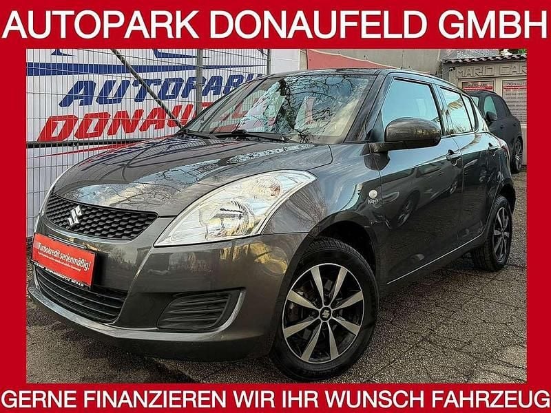 Grau Gebraucht 2011 Suzuki Swift GL Limousine | € 5.399 (Guter Preis) - Bild 1/4