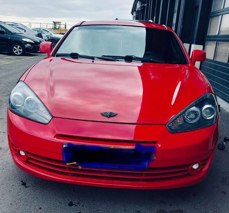 Rot Gebraucht 2007 Hyundai Coupé GLS Coupé | € 7.000 - Bild 1/4