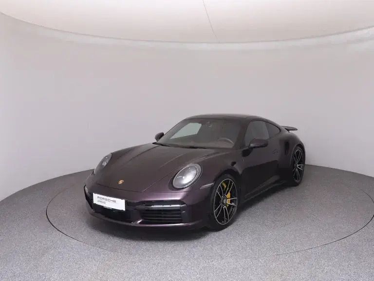 Dunkelviolett metallic Gebraucht 2024 Porsche 911 Turbo S Coupé | € 309.911 - Bild 1/4