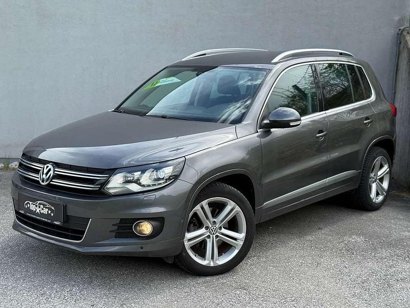 Grau Gebraucht 2014 VW Tiguan Sport SUV | € 13.990 (Fairer Preis) - Bild 1/4
