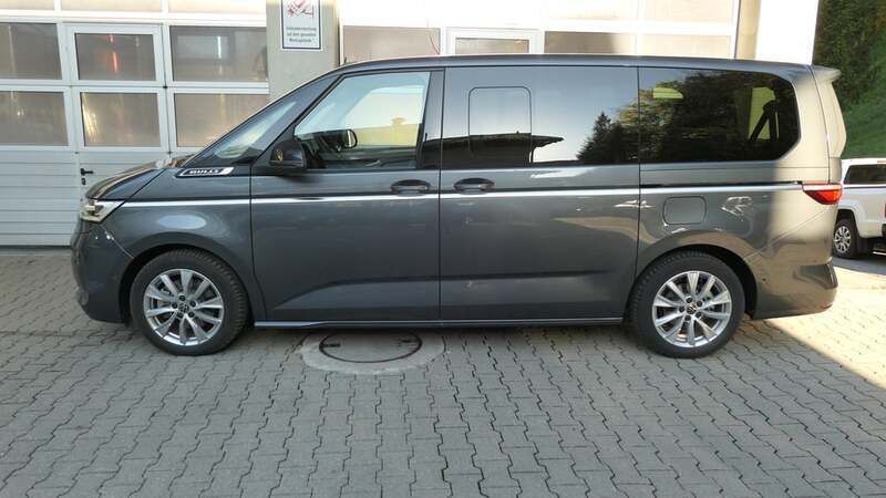 Mittelgrau metallic Neu 2025 VW Multivan Style Van | € 83.900 - Bild 1/4