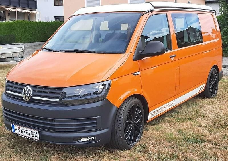 Orange Gebraucht 2017 VW Transporter California Van | € 44.900 - Bild 1/4