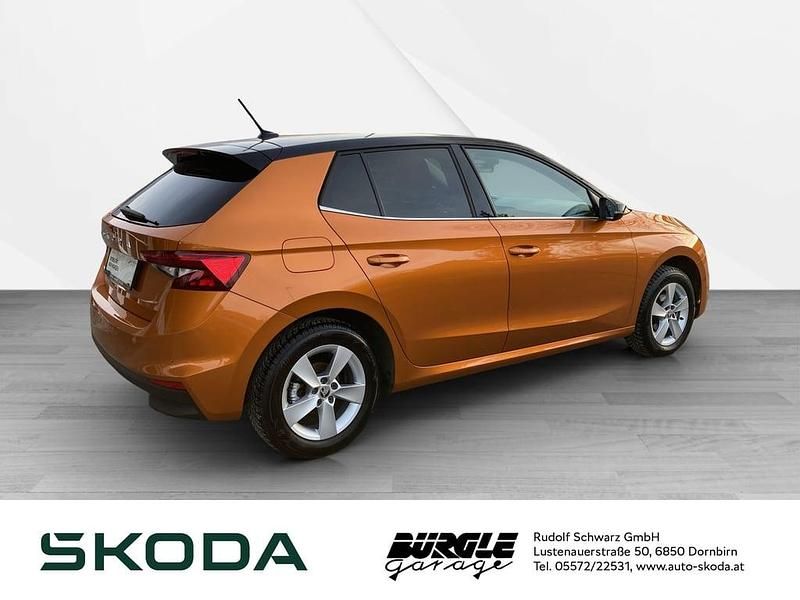 Gebraucht Skoda Fabia Style 95 PS (69 kW) 2022 Mittelorange  metallic Kleinwagen