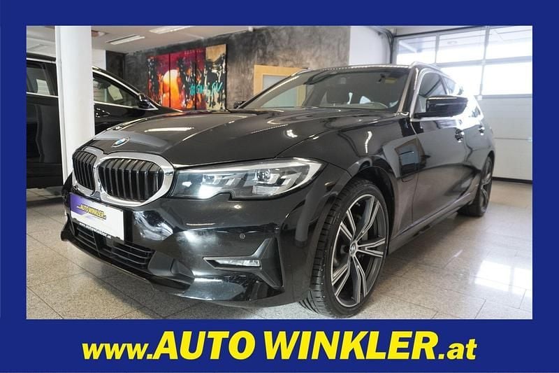 Schwarz Gebraucht 2021 BMW 330e Kombi | € 21.990 - Bild 1/4