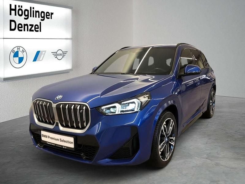 M portimao blau Gebraucht 2023 BMW iX1 M Sport SUV | € 41.290 (Fairer Preis) - Bild 1/4