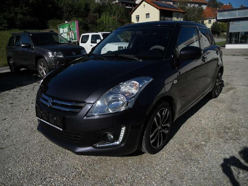 Grau Gebraucht 2015 Suzuki Swift Kombi | € 9.000 (Fairer Preis) - Bild 1/4