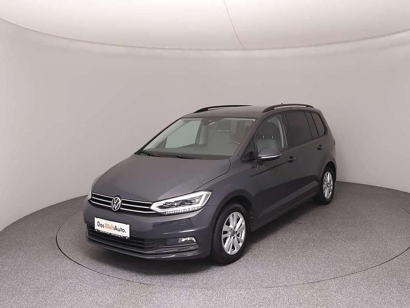 Mittelgrau normal Gebraucht 2021 VW Touran Comfortline Van / Kleinbus | € 23.490 (Guter Preis) - Bild 1/4