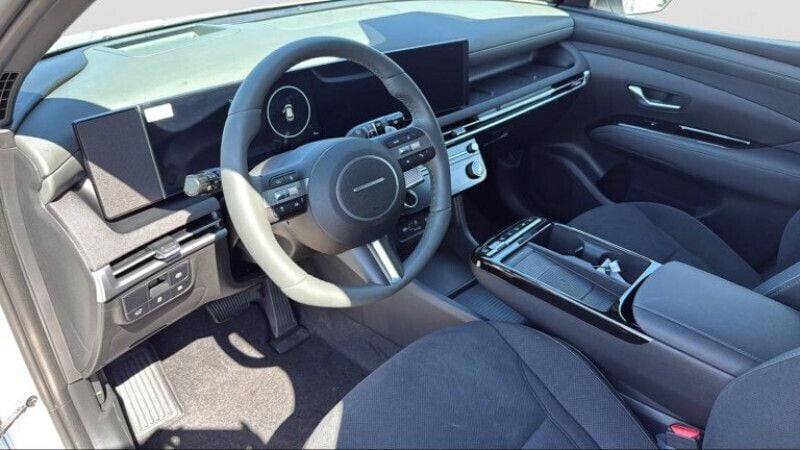 Gebraucht Hyundai Tucson 159 PS (116 kW) 2023 Serenity white / schwarz SUV