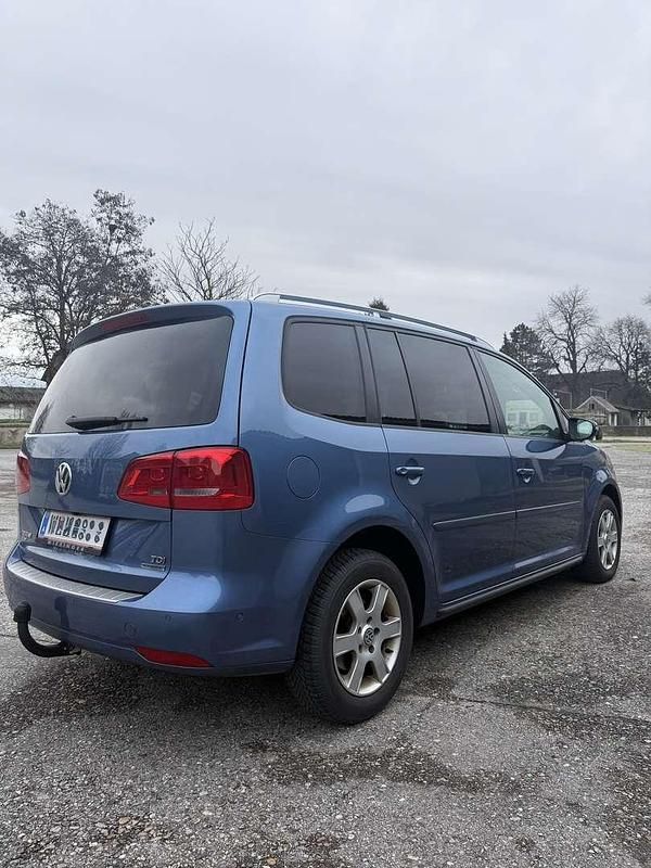 Gebraucht VW Touran Comfortline 105 PS (77 kW) 2013 Blau Van / Kleinbus