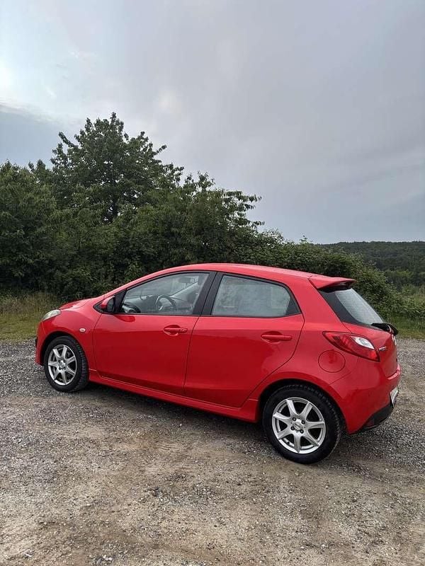 Gebraucht Mazda 2 103 PS (75 kW) 2009 Rot Kleinwagen